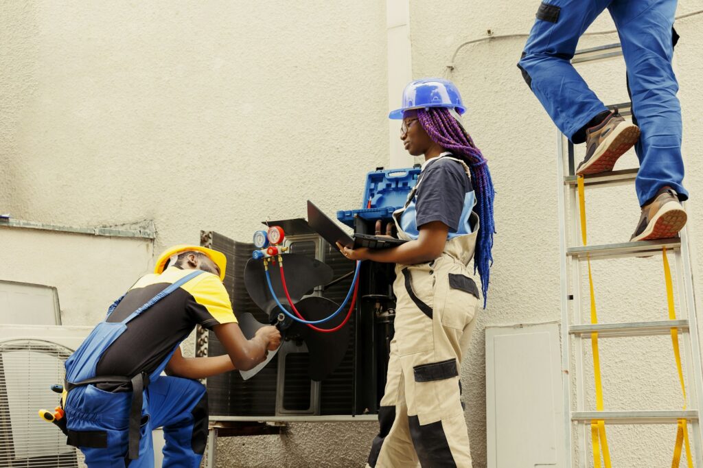 Mechanic cleaning hvac system parts